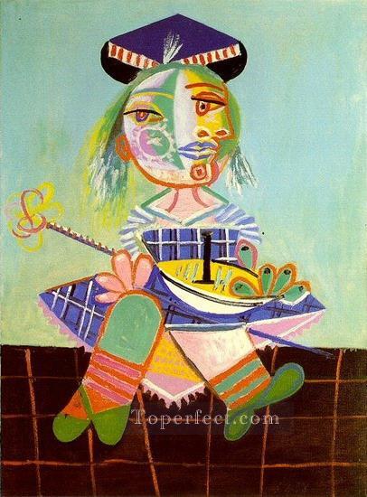 Maya tiene dos años y medio con un barco 1938 Pablo Picasso Pintura al óleo